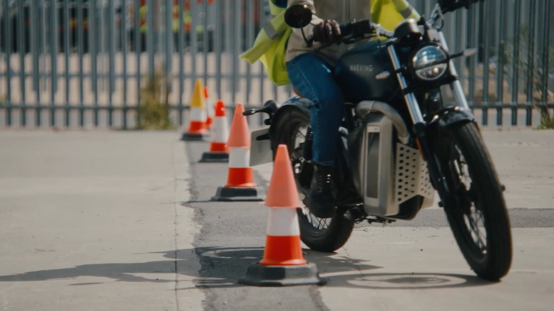 Maeving electric motorcycle instructor and student during safety training course